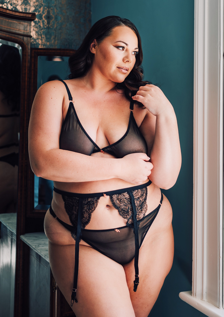 Woman wearing a Black Mesh Triangle Lingerie Set