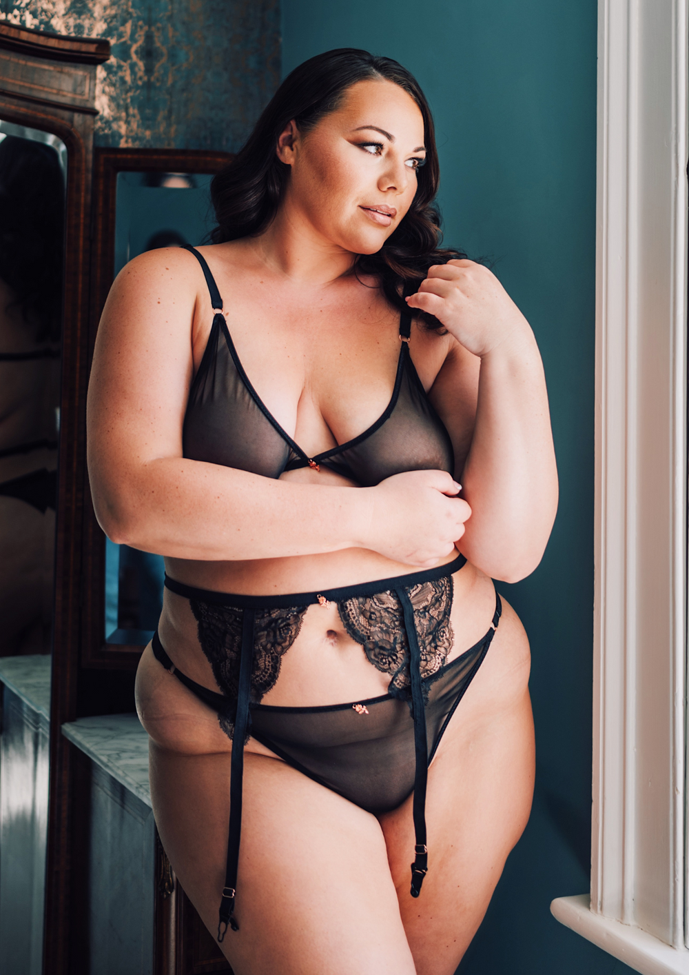 Woman wearing a Black Mesh Triangle Lingerie Set 